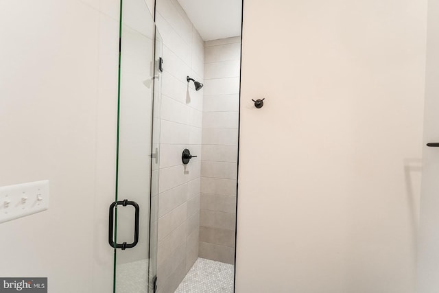 bathroom featuring an enclosed shower