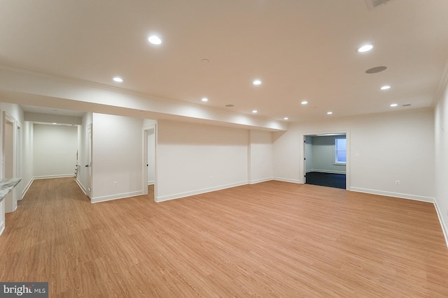 basement featuring light hardwood / wood-style floors