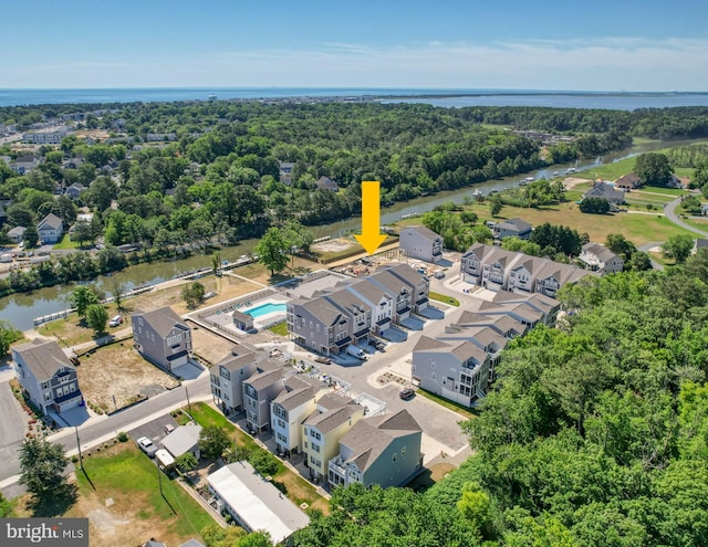 drone / aerial view with a water view