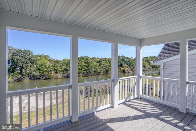 wooden terrace with a water view