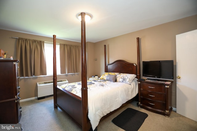 bedroom with light carpet