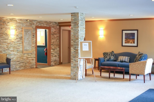 living area with crown molding, carpet flooring, recessed lighting, and decorative columns