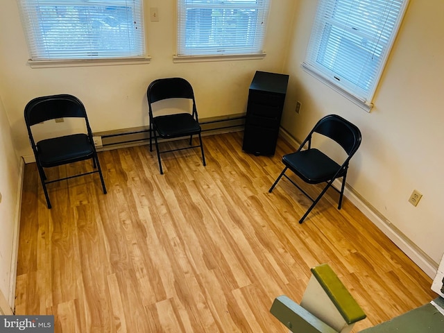 living area with light hardwood / wood-style floors