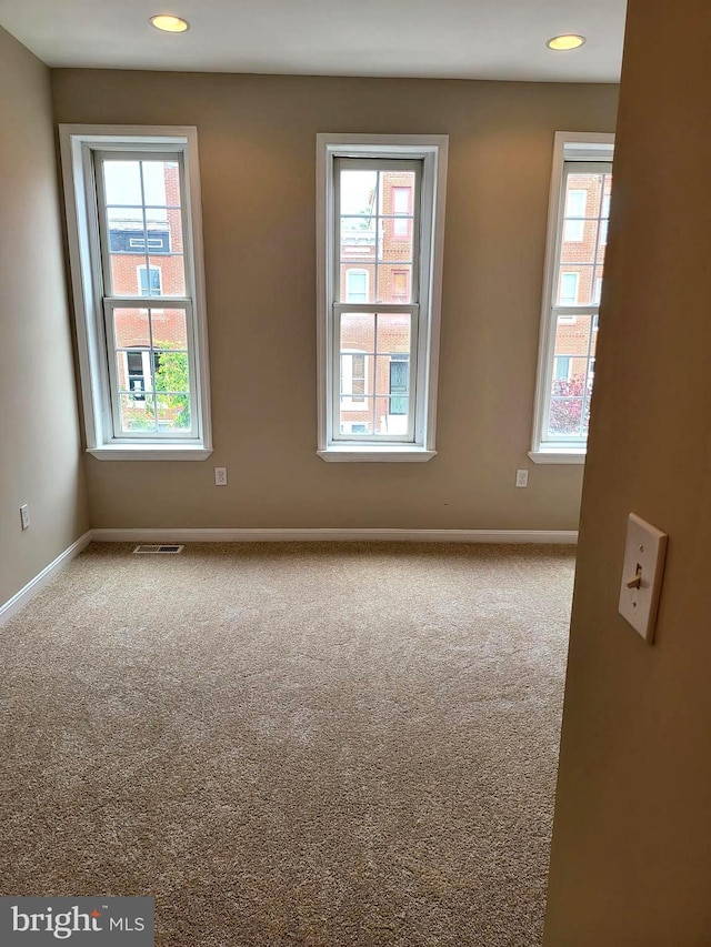 view of carpeted spare room