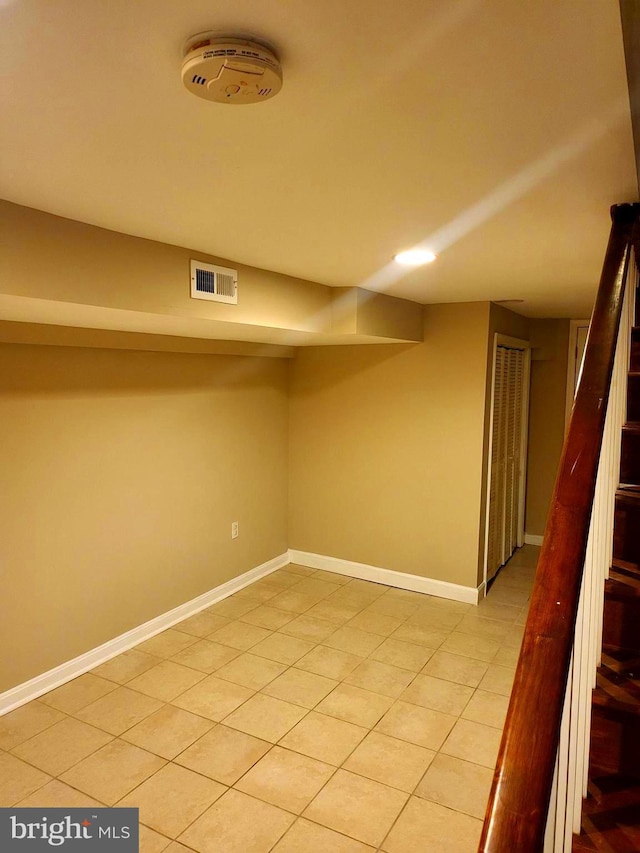 basement with light tile patterned floors