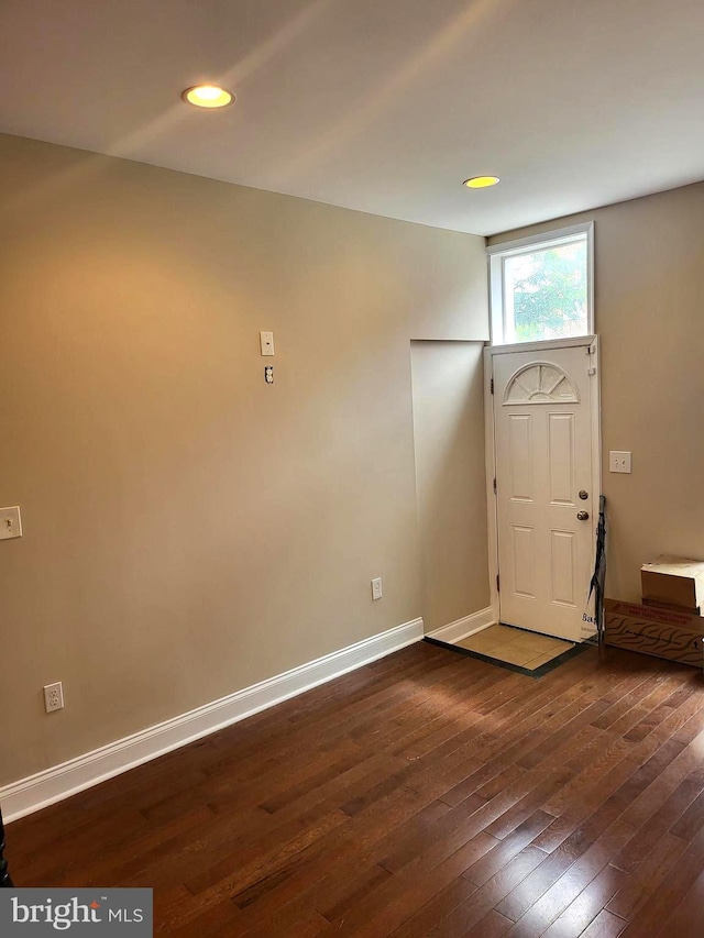 foyer entrance featuring dark hardwood / wood-style flooring