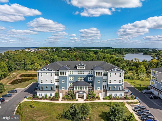 drone / aerial view with a water view