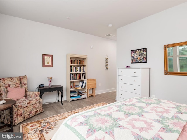 bedroom featuring light hardwood / wood-style floors