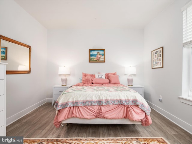 bedroom featuring wood-type flooring