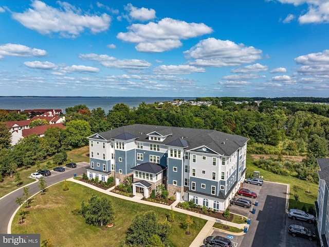 birds eye view of property featuring a water view