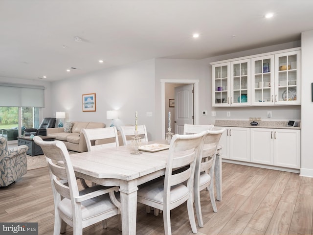 dining room featuring light hardwood / wood-style flooring