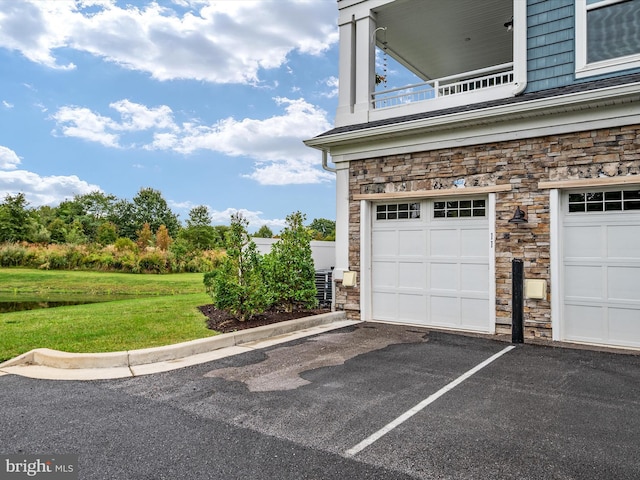 garage with a lawn