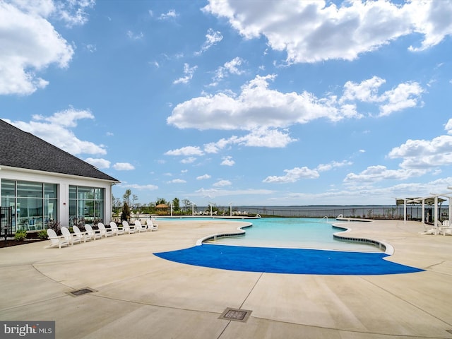 view of pool featuring a patio area