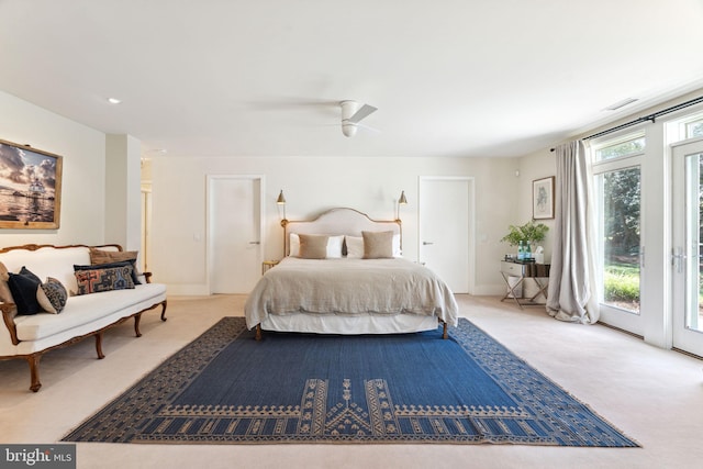 carpeted bedroom with access to outside and ceiling fan