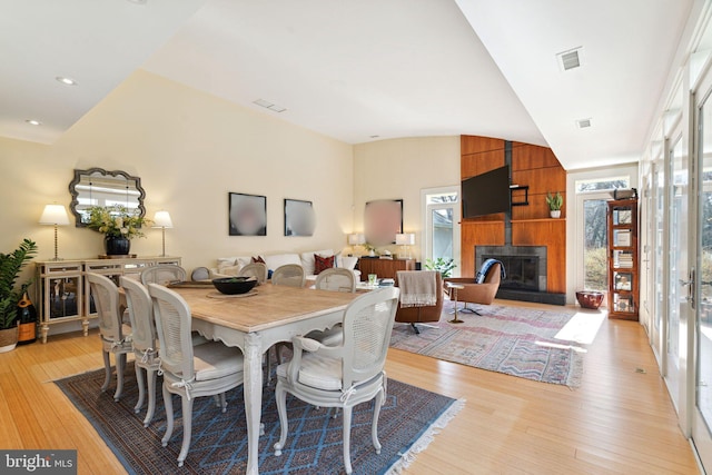 dining area with light hardwood / wood-style floors