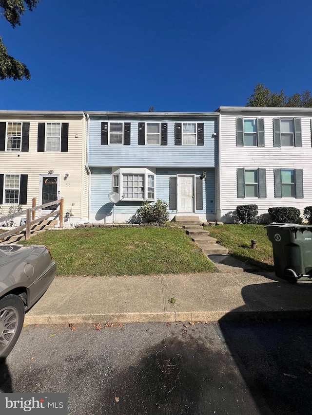 view of property with a front yard