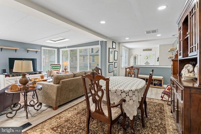 dining area with wood-type flooring