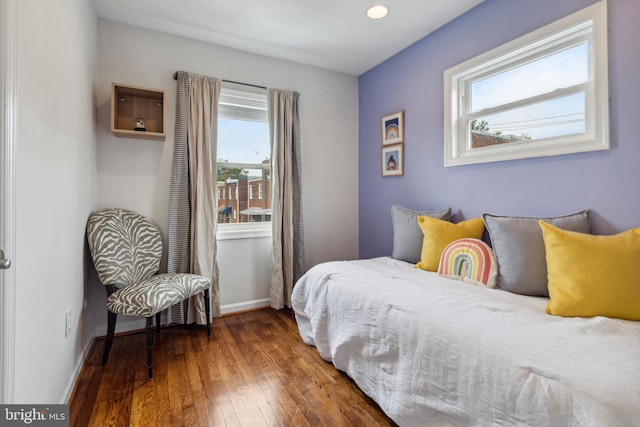 bedroom featuring dark wood-type flooring