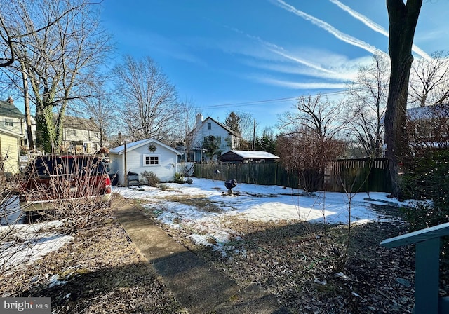 view of yard covered in snow