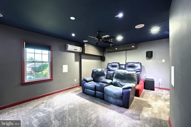 carpeted home theater with ceiling fan and a wall unit AC