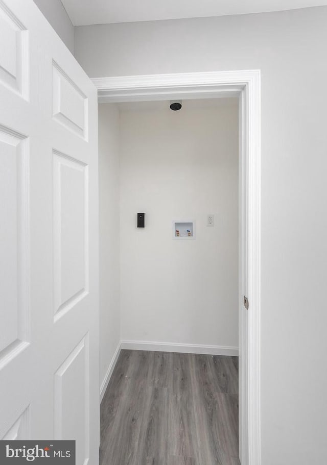 laundry room featuring wood-type flooring, hookup for an electric dryer, and hookup for a washing machine