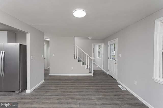 entryway featuring dark wood-type flooring