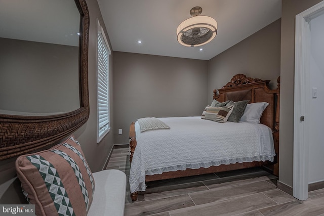 bedroom with light hardwood / wood-style floors