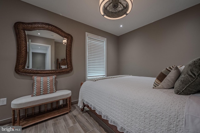 bedroom featuring hardwood / wood-style floors