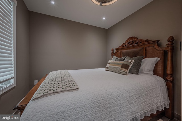 bedroom with lofted ceiling