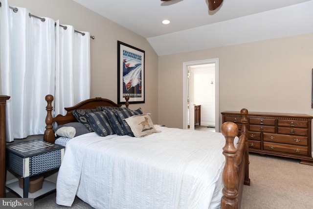 carpeted bedroom with lofted ceiling, ceiling fan, and connected bathroom