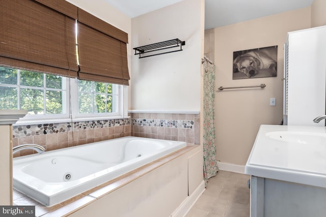 bathroom featuring vanity, shower with separate bathtub, and tile patterned floors