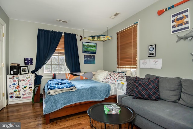 bedroom featuring hardwood / wood-style flooring