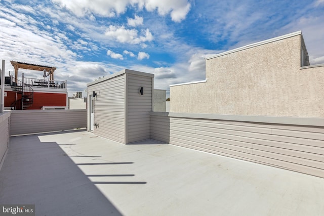 view of patio with a balcony