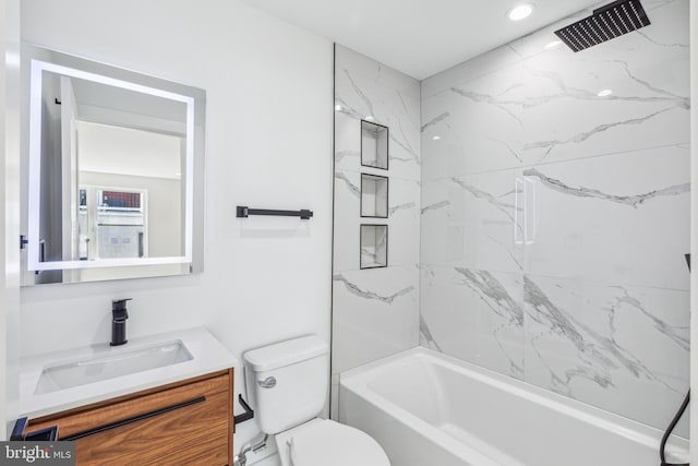 full bathroom with tiled shower / bath combo, vanity, and toilet