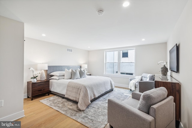 bedroom featuring light hardwood / wood-style floors