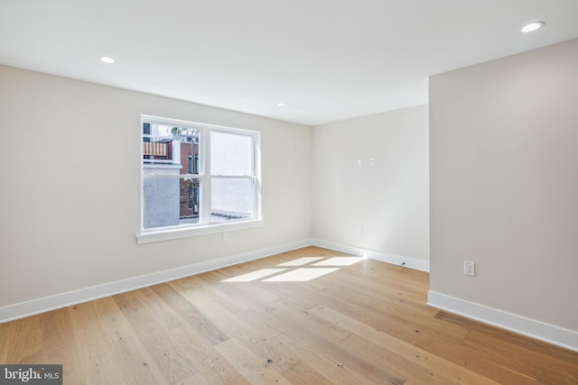 empty room featuring light hardwood / wood-style floors