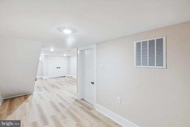 hall featuring light hardwood / wood-style floors