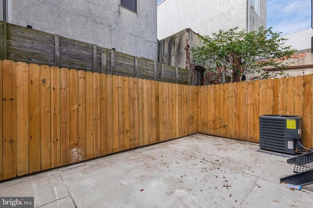 view of patio with cooling unit