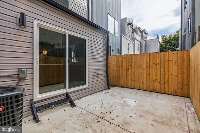 view of patio / terrace featuring cooling unit