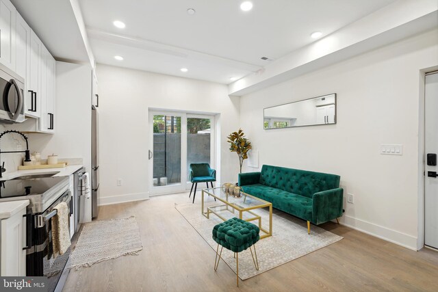 living room featuring light wood-type flooring