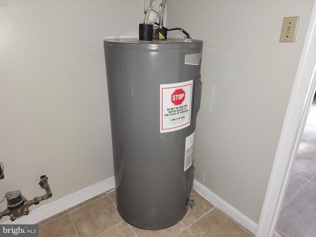 utility room with electric water heater