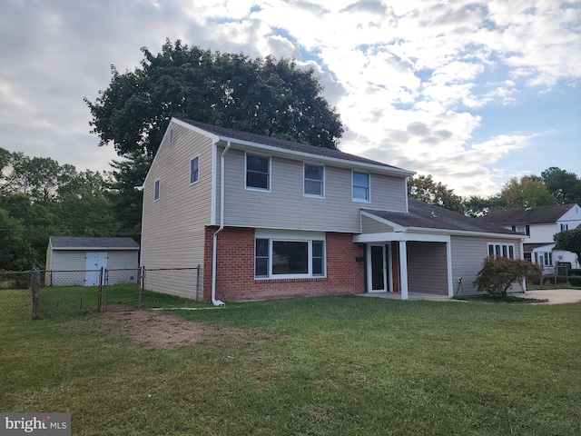 view of front facade featuring a patio and a front yard