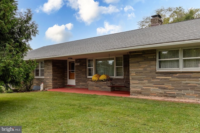 exterior space with a front yard