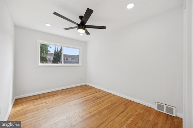 empty room with visible vents, baseboards, ceiling fan, recessed lighting, and light wood-style flooring