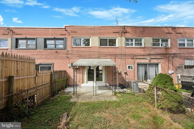 rear view of house with a patio area