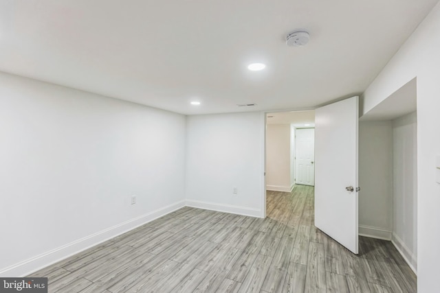 unfurnished room featuring light hardwood / wood-style floors