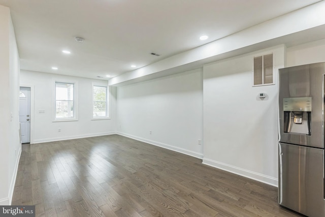 interior space with dark hardwood / wood-style floors