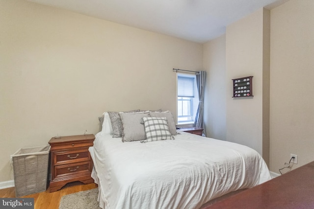 bedroom featuring light hardwood / wood-style flooring