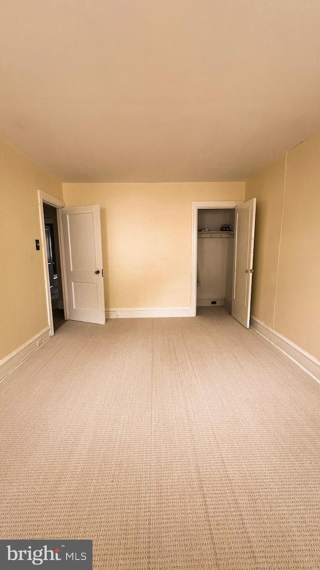 unfurnished bedroom with carpet flooring