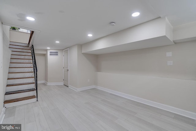 basement with light wood-type flooring